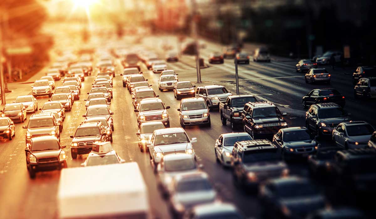 Highway traffic at sunset