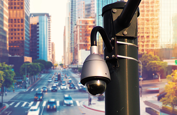 Traffic camera over city street.