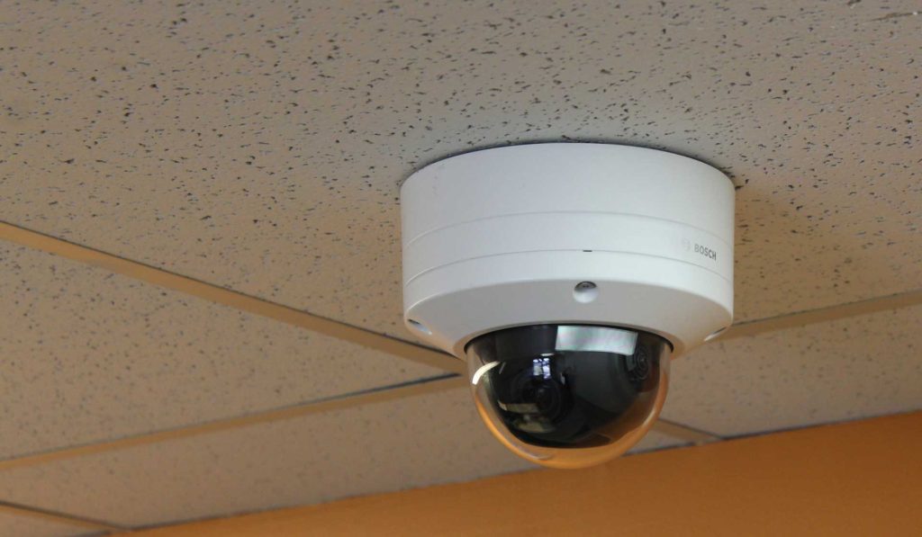 Bosch camera attached to tiles in ceiling.