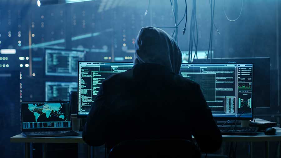 Hacker at a computer.