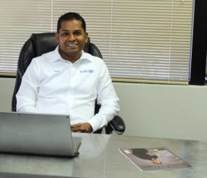 Navin Nageli at his desk
